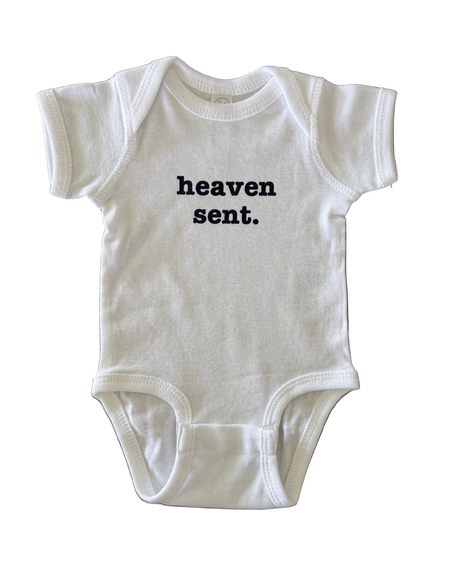 Heaven sent on a white onesie