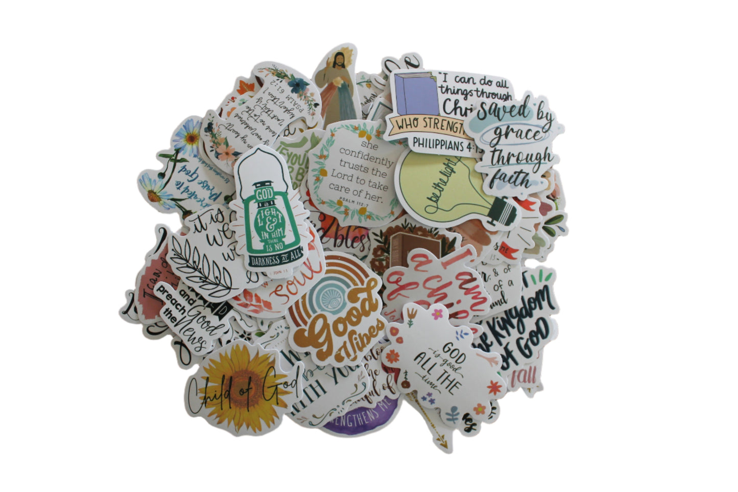 A collection of various colorful stickers with inspirational religious quotes and designs.